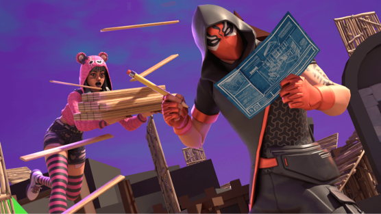 A male Fortnite character with a red mask looks at a blueprint while a multi-racial female Fortnite character wearing a pink bear hoodie stacks pieces of wood behind him.